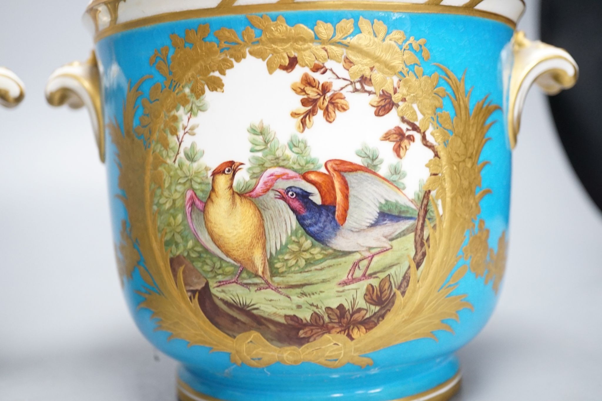 A pair of mid 19th century English porcelain cache pots, 14.5 cms high.